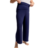 Navy blue wide-leg pants worn by a person on a white background