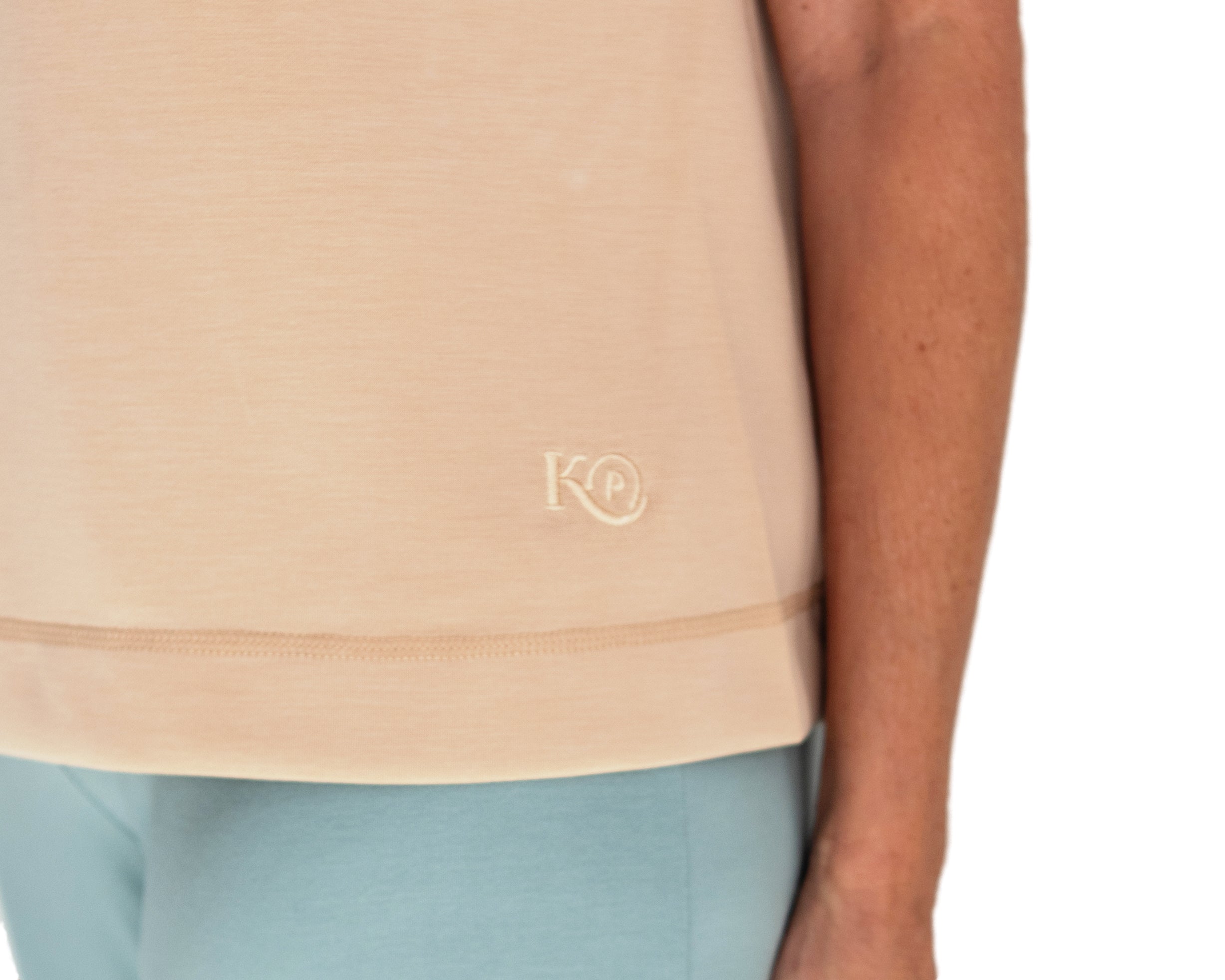 close up of mastectomy tank fabric and KickIt logo