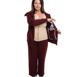 Woman in mulberry red recovery set front open showcasing the inside drain pockets