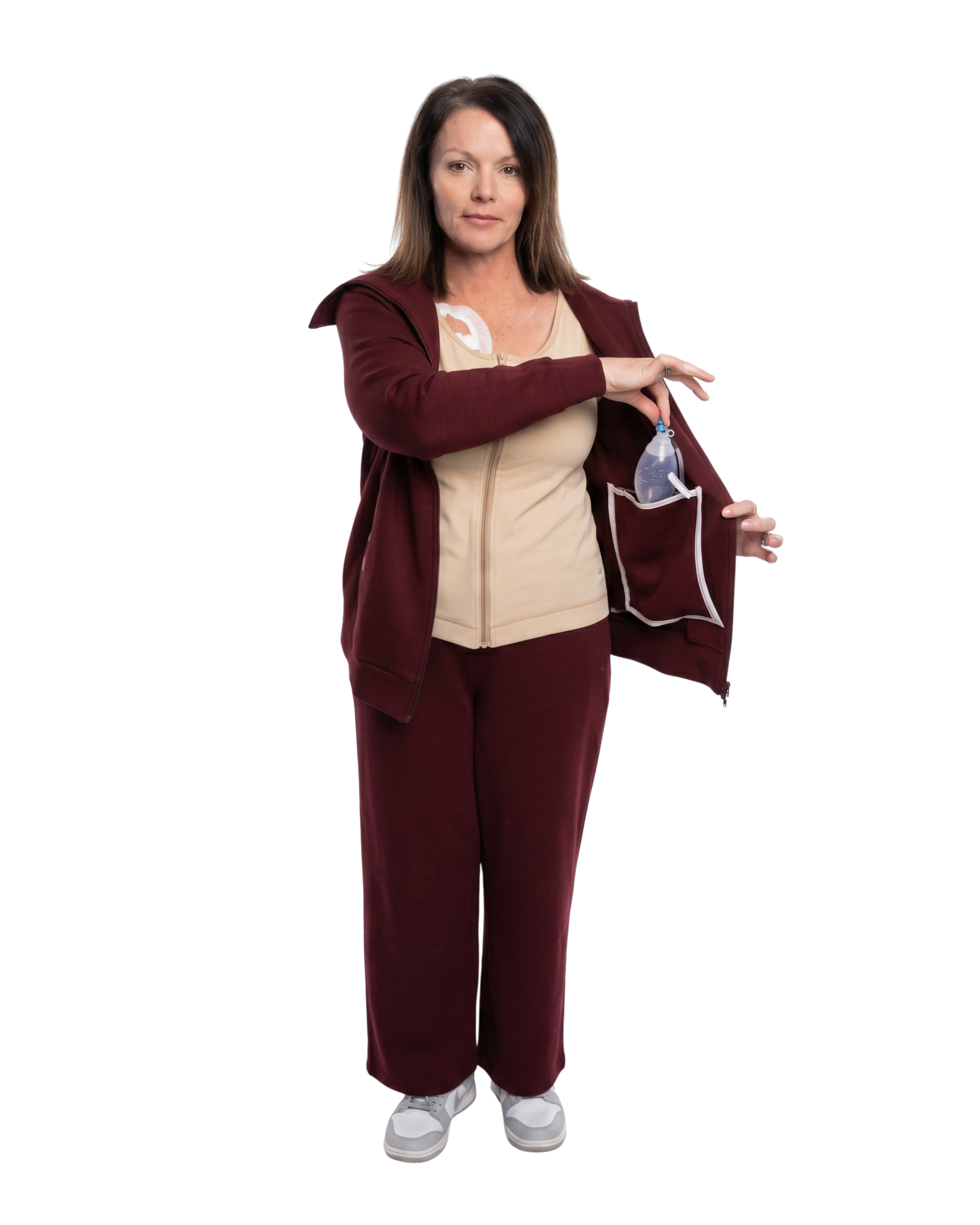 Woman in mulberry red recovery set front open showcasing the inside drain pockets