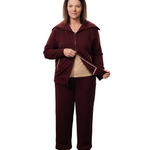 Woman in mulberry red recovery set front shot showcasing the dual way zipper