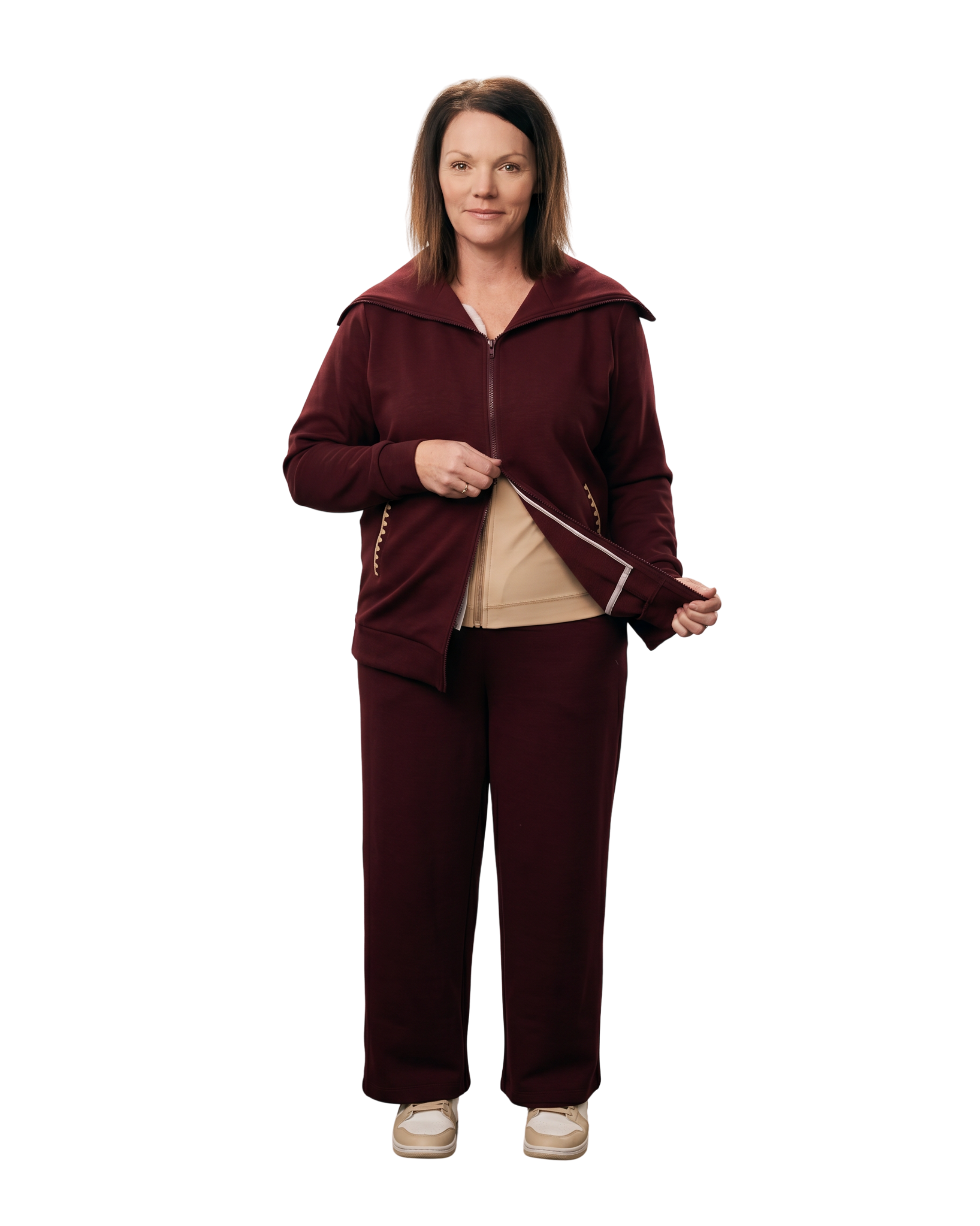 Woman in mulberry red recovery set front shot showcasing the dual way zipper