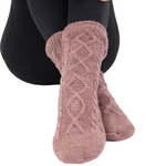 Rose Slipper Socks on Woman wearing Black pants against a white background