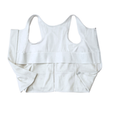 white post surgery tank top with a front zipper on a white background, fabric close up that highlights adaptive functionality